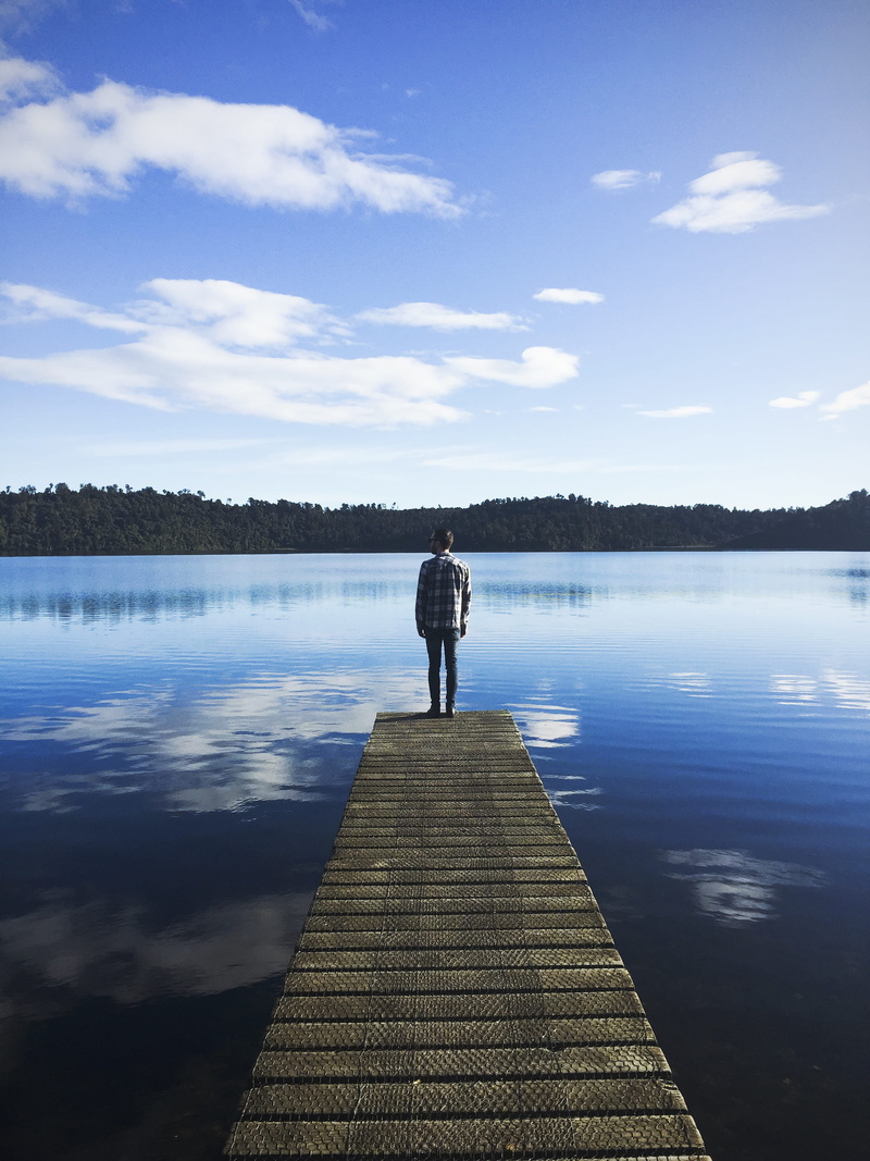 leisure activity, men, pier, tranquil Scene, lifestyles, blue, women, day, full length, cloud - sky, outdoors, watching, solitude, landscape, nature, sky