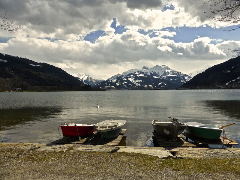 tranquil scene, mountain, quiet, water, sky, tranquility, transportation, nautical vessel, no people, solitude, rowboat, day, cloud - sky, view, beauty in nature