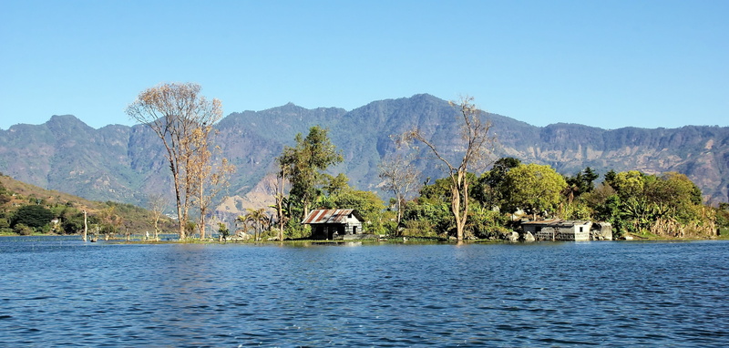 beauty in nature, waterfront, travel, tranquility, lake, no people, blue, outdoors, built structure, day, guatemala, nature, scenics - nature, architecture