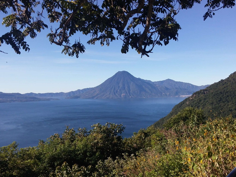 volcano, tranquil scene, land, mountain peak, scenics - nature, landscape, tranquility, day, growth, mountain range, blue sky, atitlan, water, nature, idyllic