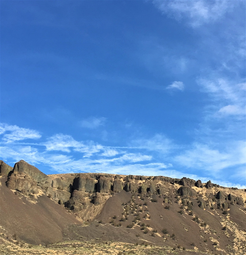 sky, mesa, coulee city, outdoors, climate, grassland, landscape, environment, cloud - sky, mountain, bunker, blue, nature, rock - object, arid climate