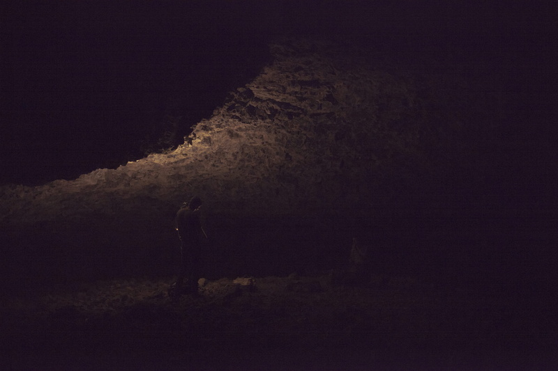 night, water, dark, rock, nature, black background, one animal, rock - object, light, soap lake, outdoors, sky, mammal, no people, 5K, motion, rocks, cave