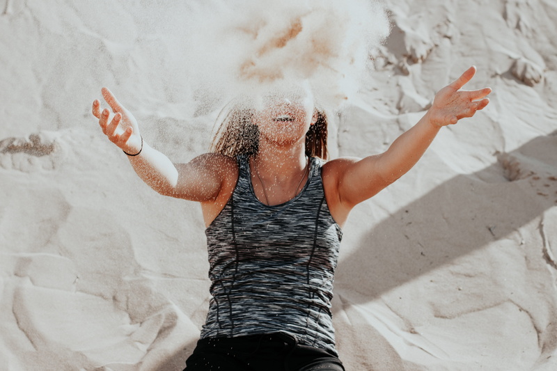 wearing, hairstyle, lifestyles, tank, vitality, healthy lifestyle, arms outstretched, arms raised, arms, human arm, black, emotion, top, human limb, throwing