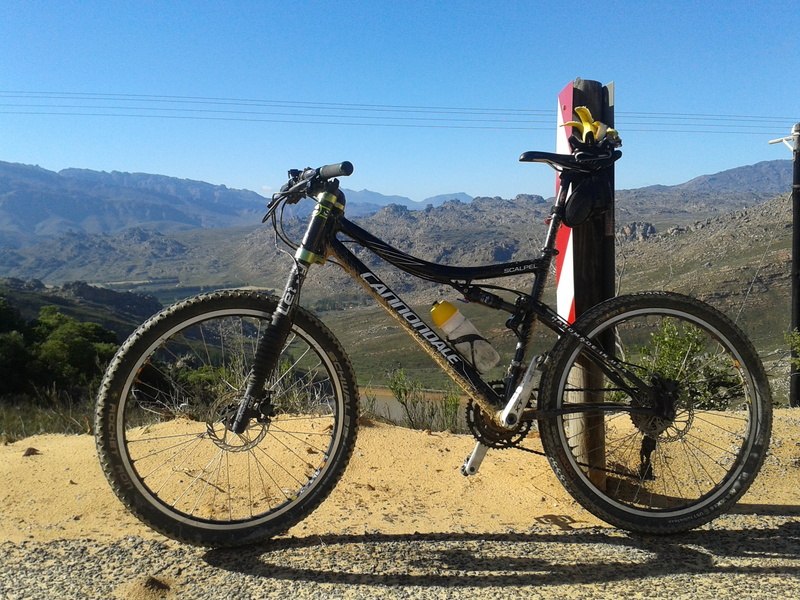 bicycle, stationary, mountain Bike, land vehicle, beauty in nature, cycling, scenics - nature, mountain, mountain range, shadow, sport, wide open spaces