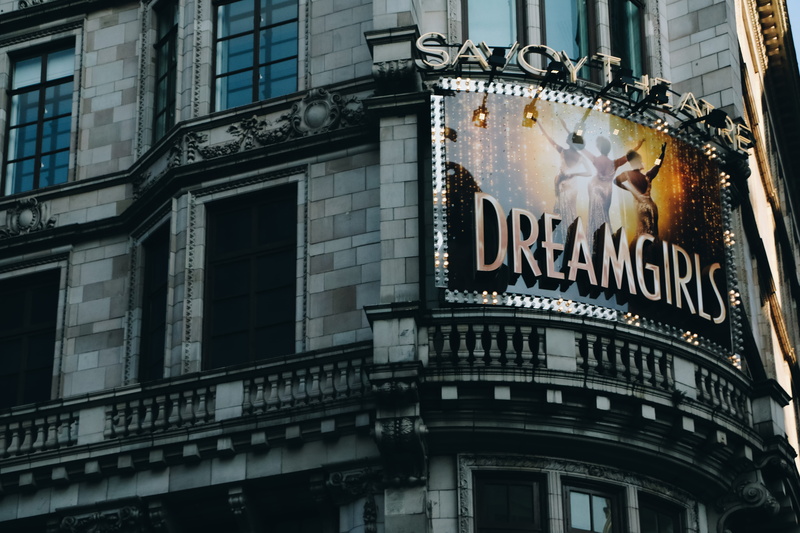 billboard, communication, city, history, architecture, show, outdoors, advertisement, no people, western script, movies, window, capital letter, urban