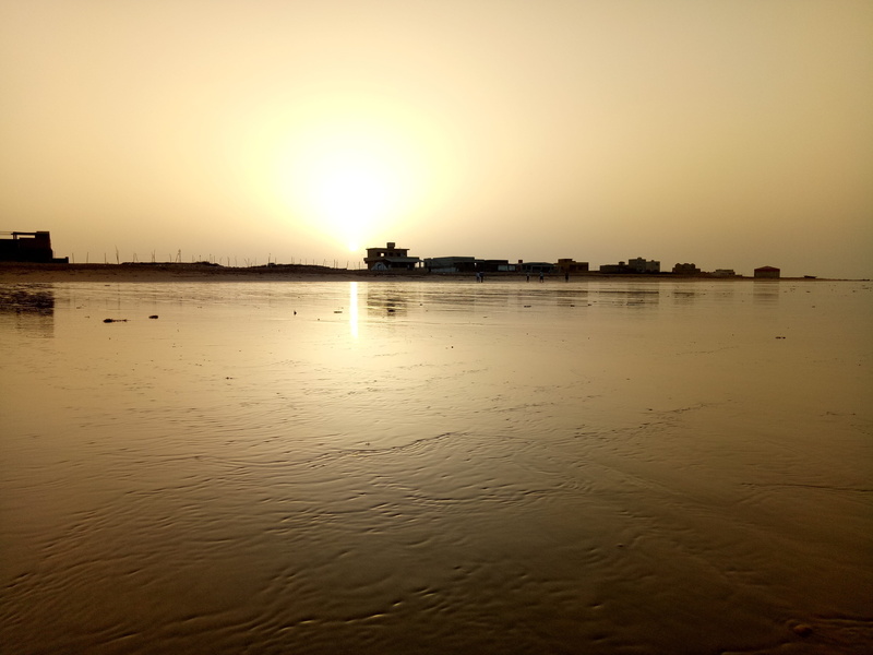 tranquil scene, sunlight, 4K, sun, idyllic, land, sunset, sea, beauty in nature, scenics - nature, no people, karachi, beach, outdoors, sunshine, pollution