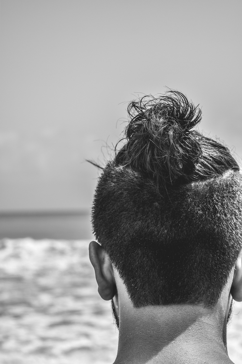 one person, karachi, sky, hawkes bay, rear view, looking at view, human hair, shirtless, hair, water, monochrome, people, black and white, portrait, matte