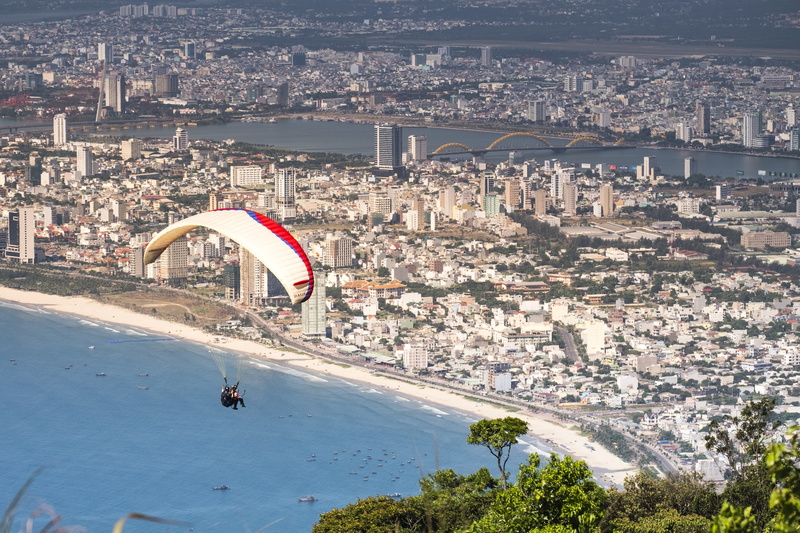 on, the sea, fly, outdoors, travel destinations, cartoon, excitement, people, summer, though, glider glider, flying, high angle view, slide, vietnam, the air