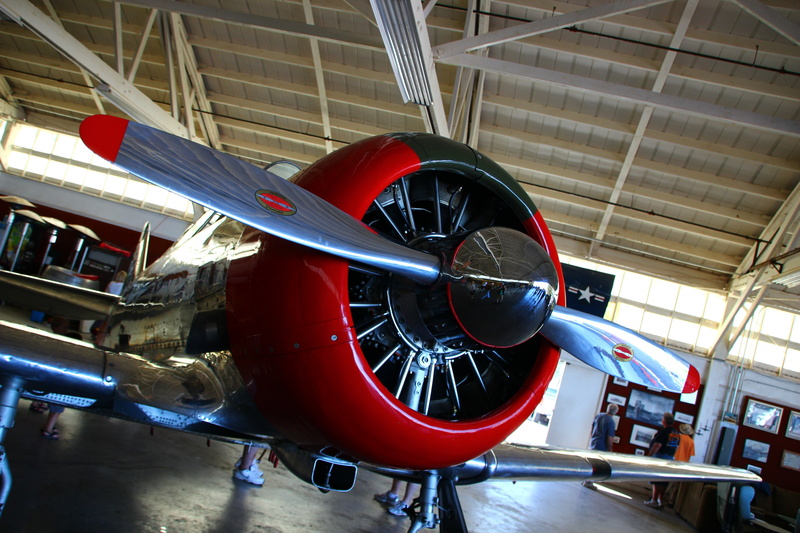 indoors, motor, wheel, aerospace industry, museum, airplane hangar, engine, red, travel, commercial airplane, machine part, technology, mode of transportation