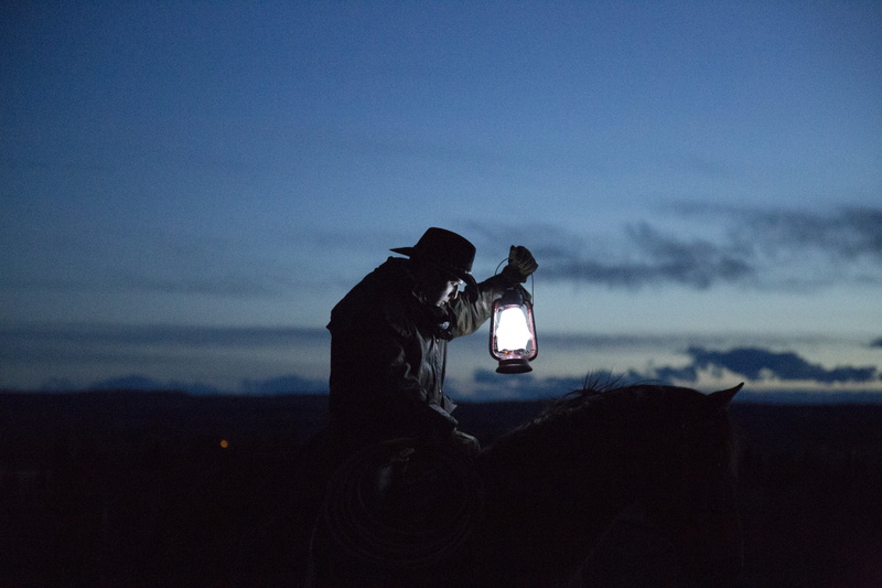 cloud - sky, lamp, nature, side view, digital camera, photography themes, men, horseback riding, photographer, cowboy hat, lifestyles, light, night, dawn