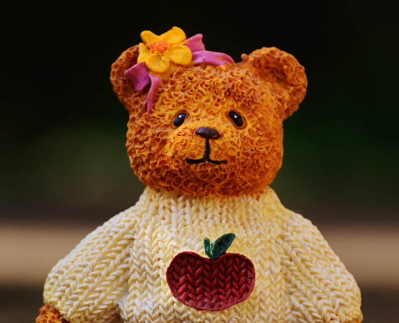 plush, stuffed Toy, brown, food, white, human representation, black background, cute, freshness, wearing, funny, knitted, close-up, food and drink, indoors