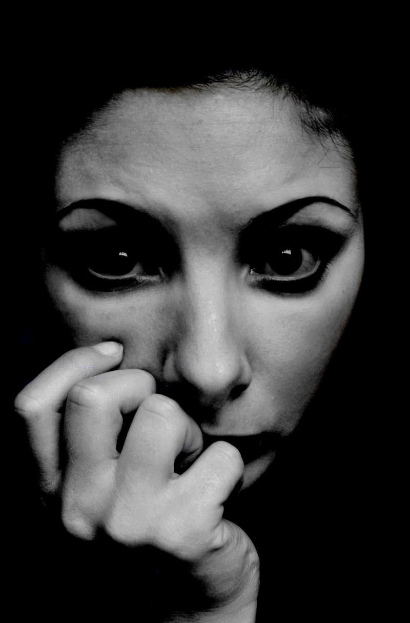 finger, real people, finger on lips, threatened, distraught, one person, model, human body part, 2K, young adult, lifestyles, women, anxious, studio shot