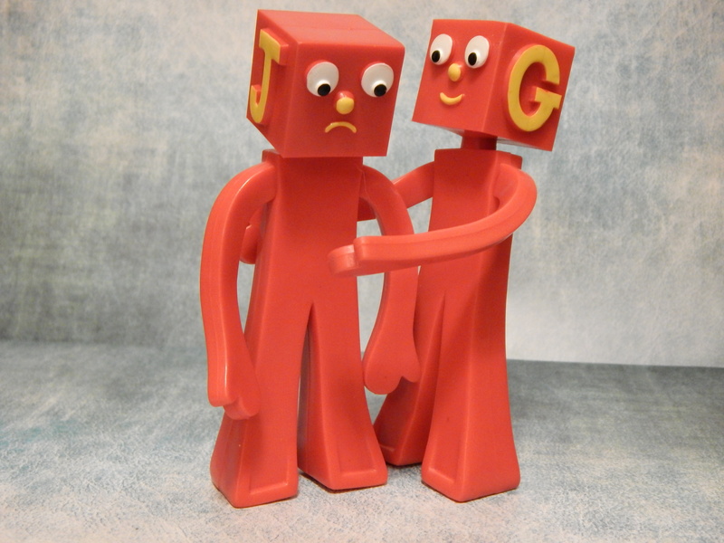 plastic, wood - material, focus on foreground, indoors, j, emotion, embrace, care, toys, no people, female likeness, soothe, art and craft, friendship