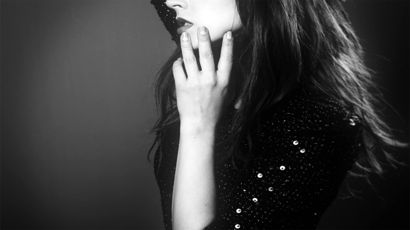 human hand, young adult, hands, covering, finger, hand, young women, human face, black hair, body part, hairstyle, adult, studio shot, one person, obscured face