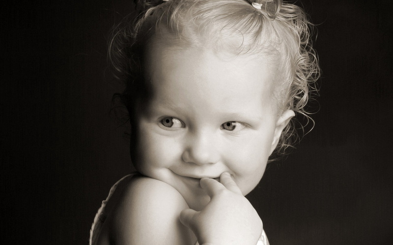 black background, human Face, indoors, black And White, small, face, preschool age, beautiful, girl, cheerful, looking At Camera, beauty, baby Girls, headshot