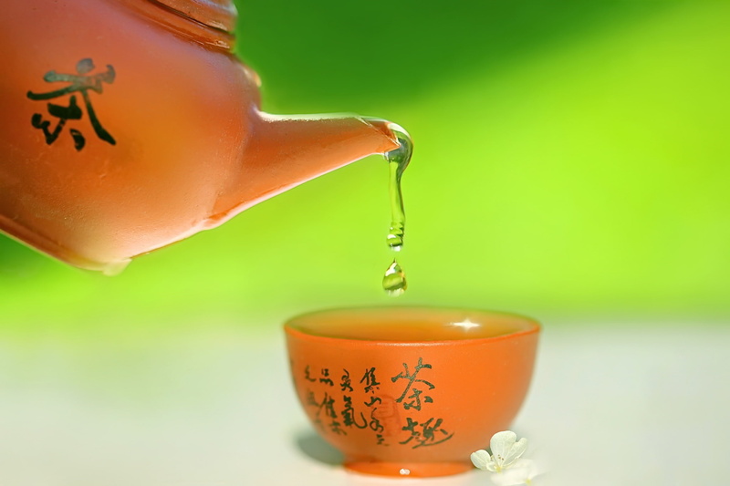 food, drink, green background, green color, tea - hot drink, tea, cup, mug, colored background, refreshment, focus on foreground, pouring, indoors, wellbeing