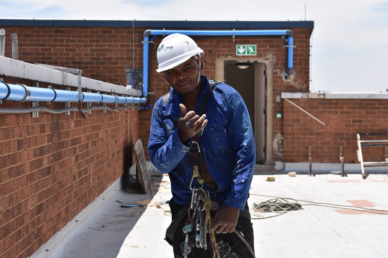 cold temperature, warm clothing, clothing, holding, gear, happiness, occupation, winter, outdoors, johannesburg, safety, day, one person, south africa