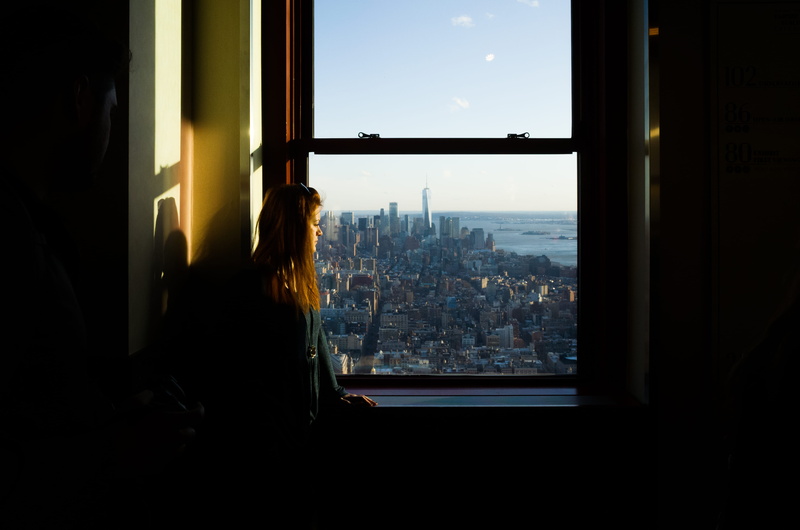 city, person, real people, office building exterior, window, glass, united state, sunlight, 4K, looking at view, new york, horizon, looking, silhouette