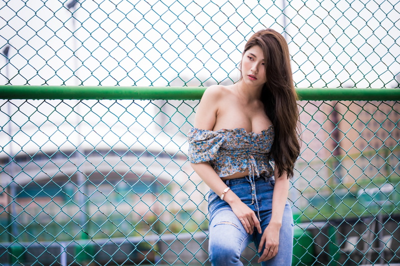 brunette, women, parted lips, water drops, jeans, looking away, women outdoors, model, chain-link, cleavage, Asian, long hair, frontal view, crop top, depth of field