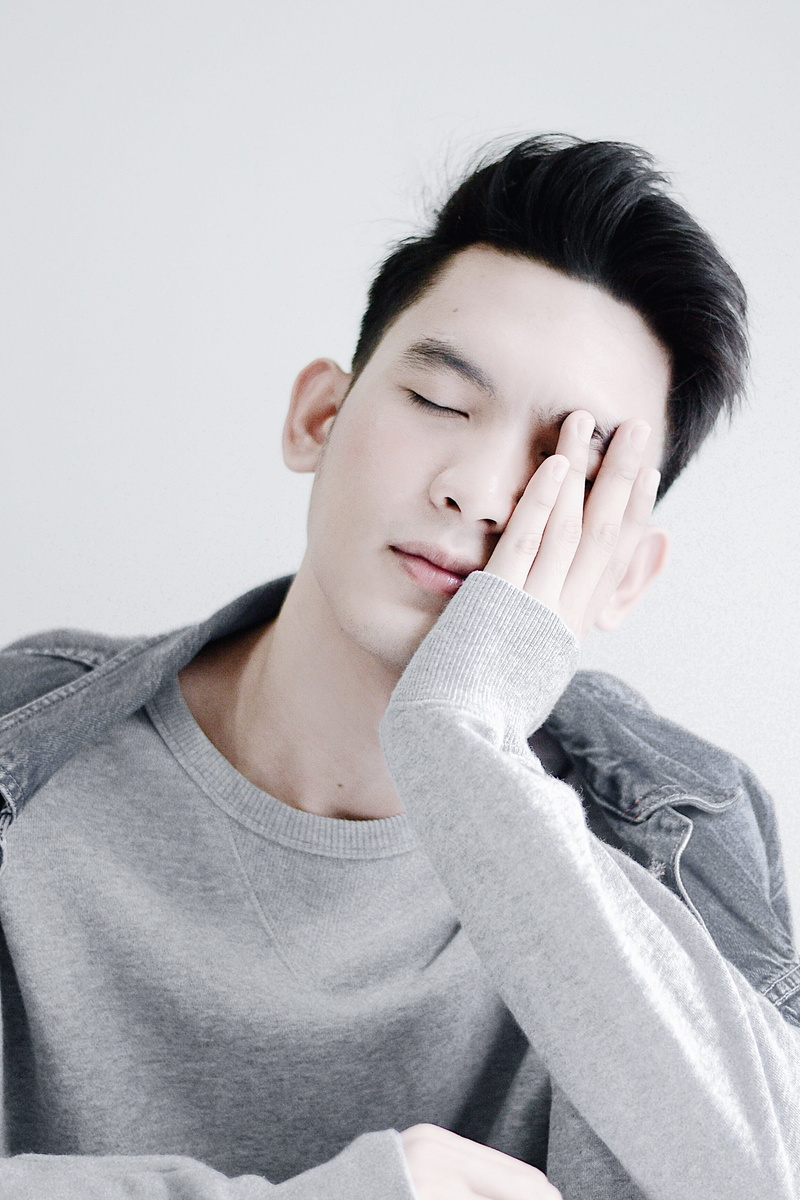 man, headshot, male, face, contemplation, casual clothing, one person, sleeping, black hair, lifestyles, hand, portrait, young adult, leisure activity