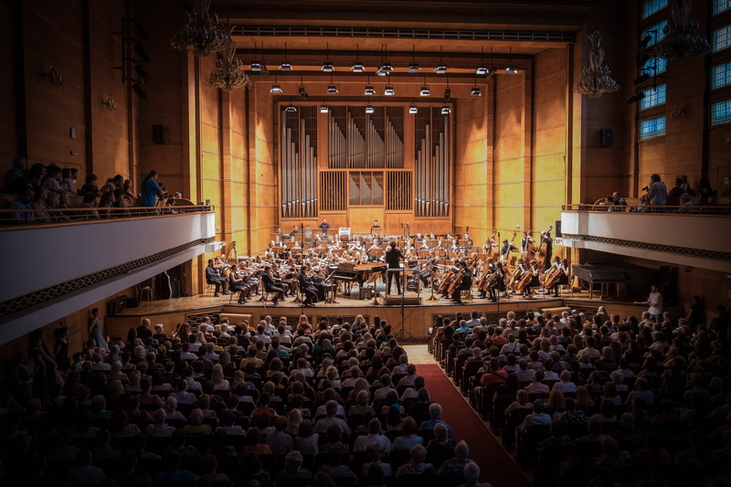 4K, large group of people, built structure, audience, watching, sitting, lifestyles, women, musician, theater, person, leisure activity, indoors, stage