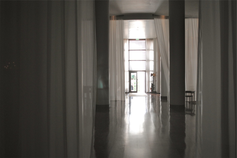 domestic room, architecture, streaming, dark, door, absence, building, no people, indoors, empty, corridor, drapes, sunlight, arcade, entrance, glass - material