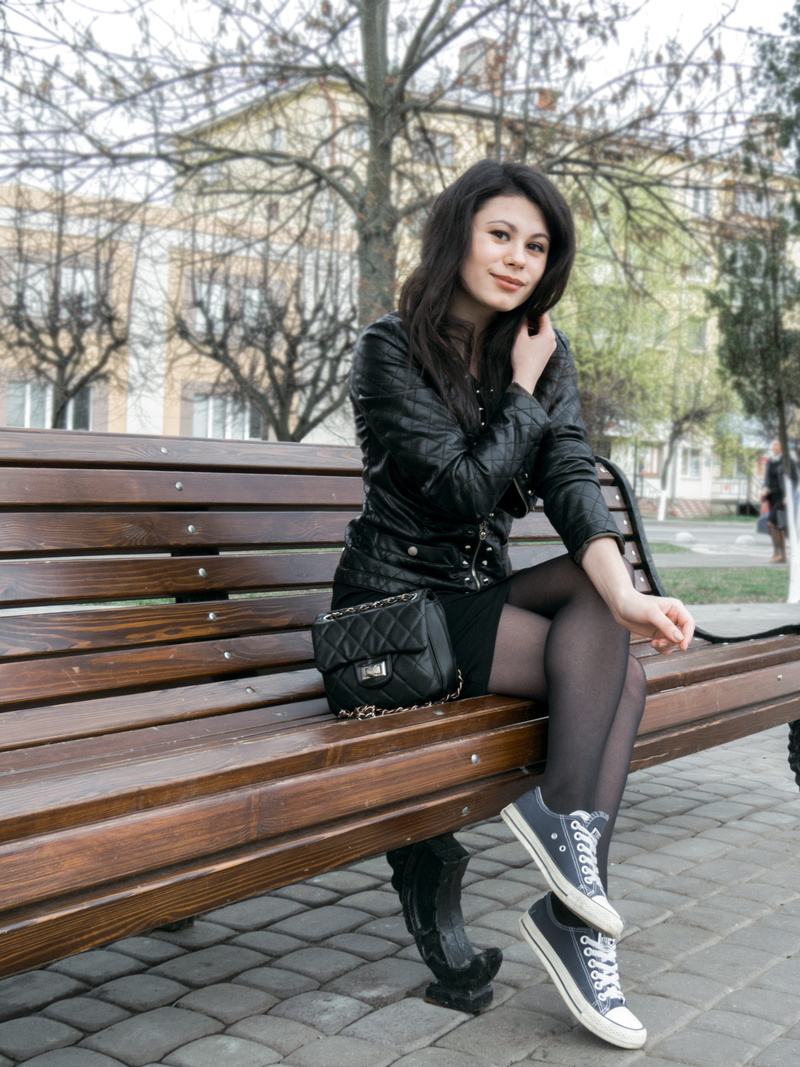 Model, fashion, one person, leather, portrait, 4K, warm clothing, hairstyle, legs crossed at knee, living nature, brown hair, adults only, Girl, Day, city