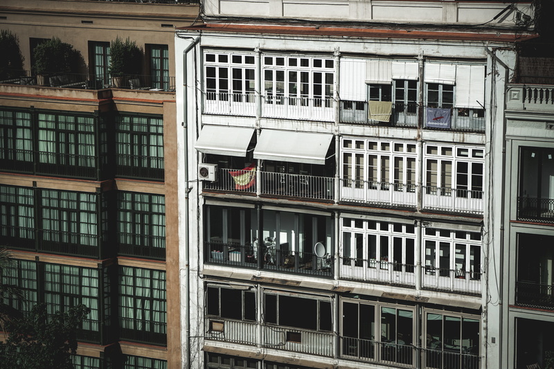 vehicle, residential district, balcony, architecture, home decor, 5K, sunlight, banister, outdoors, air conditioner, transportation, town, city, built structure