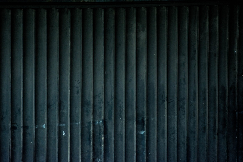 pattern, shutter, repetition, backgrounds, brick, female, stage, metal, day, gate, window shade, wooden, clothing, barrier, fence, black, corrugated, corrugated iron