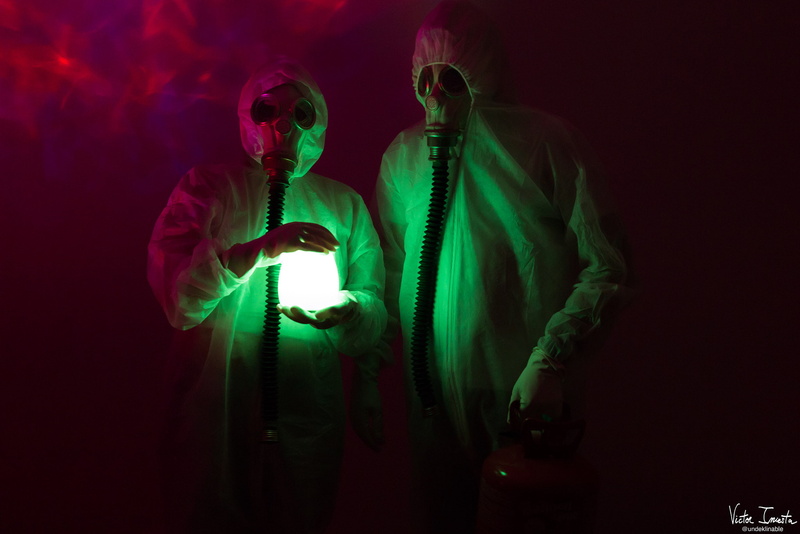 communication, green color, Víctor Iniesta, studio shot, adult, indoors, science, night, holding, clothing, lighting equipment, landline phone, gas masks