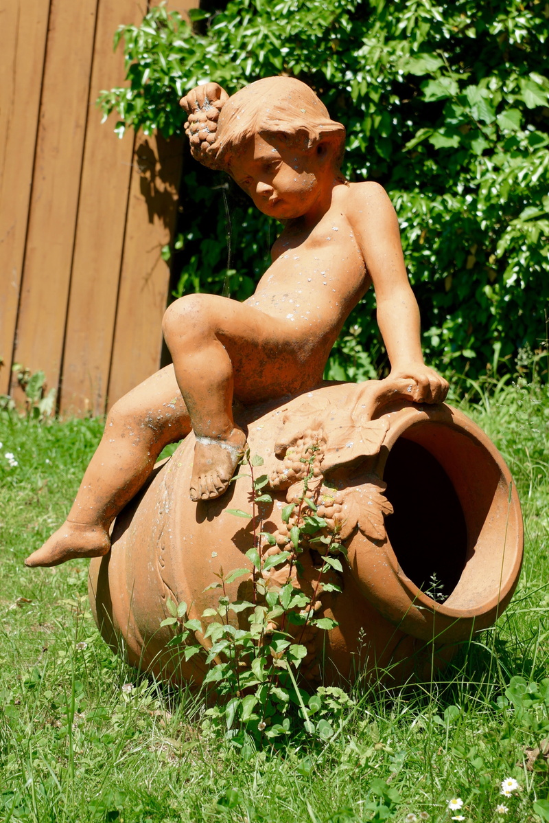 day, real people, one Person, pose, growth, art and craft, nature, front or back yard, garden decoration, craft, grass, male likeness, jar, shirtless, representation