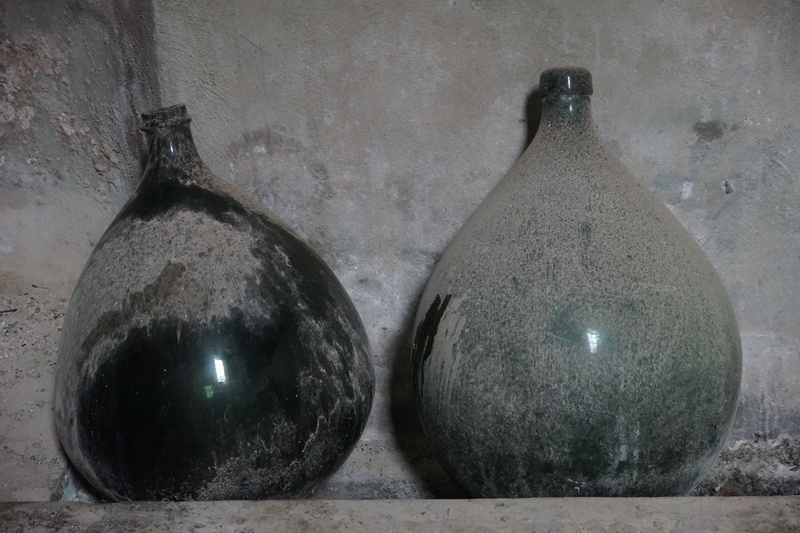 the past, group of objects, bottles, three objects, olive oil, no people, two objects, lighting, food and drink, architecture, wall - building feature