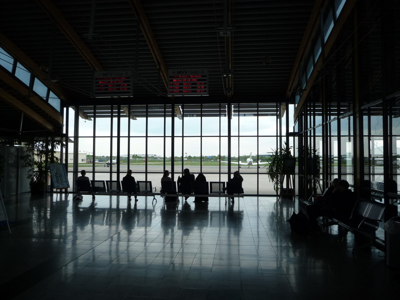 seat, day, transportation, architecture, chairs, absence, glass - material, silhouette, built structure, waiting area, waiting, sitting, chair, people