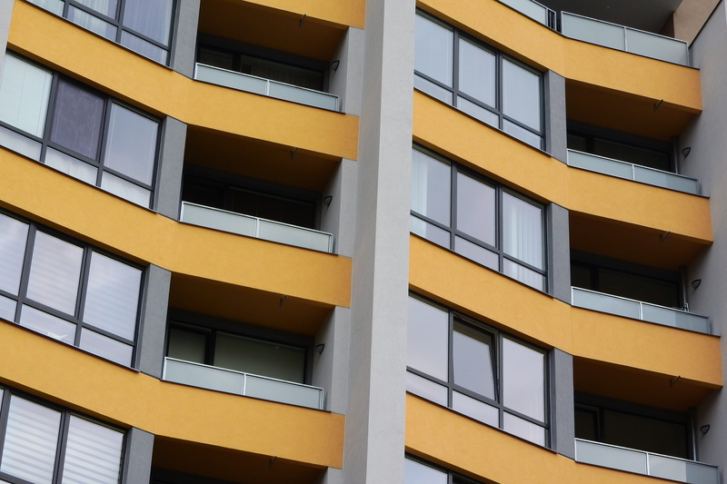 urban housing, no people, built structure, outdoors, yellow, glass - material, in a row, design, Architecture, balconies, clean, city, backgrounds, office building exterior