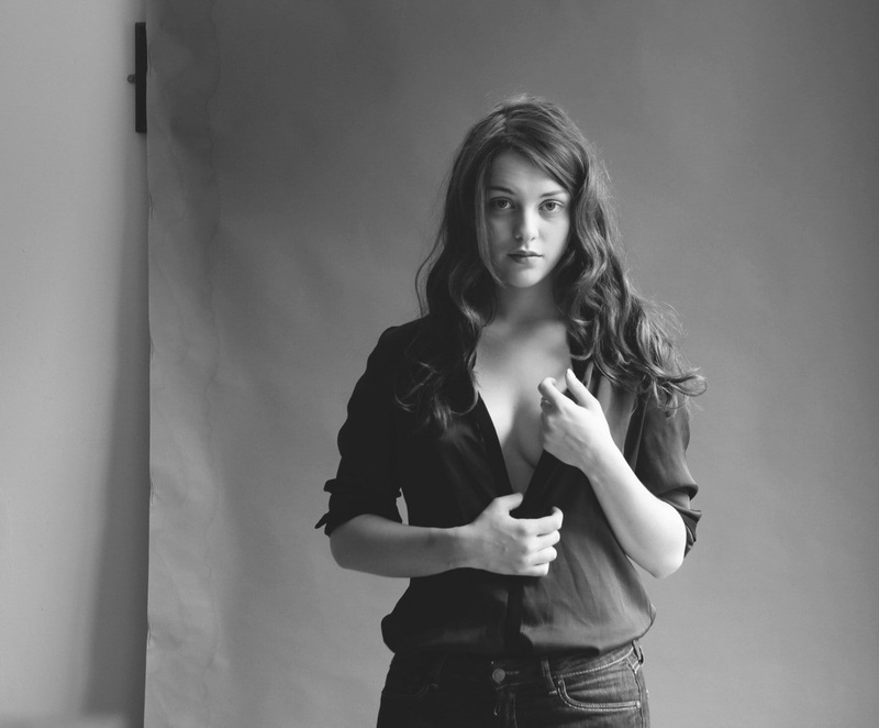 women, indoors, beauty, beautiful woman, casual clothing, hairstyle, waist up, hair, young adult, lifestyles, looking at camera, holding, imogen dyer women