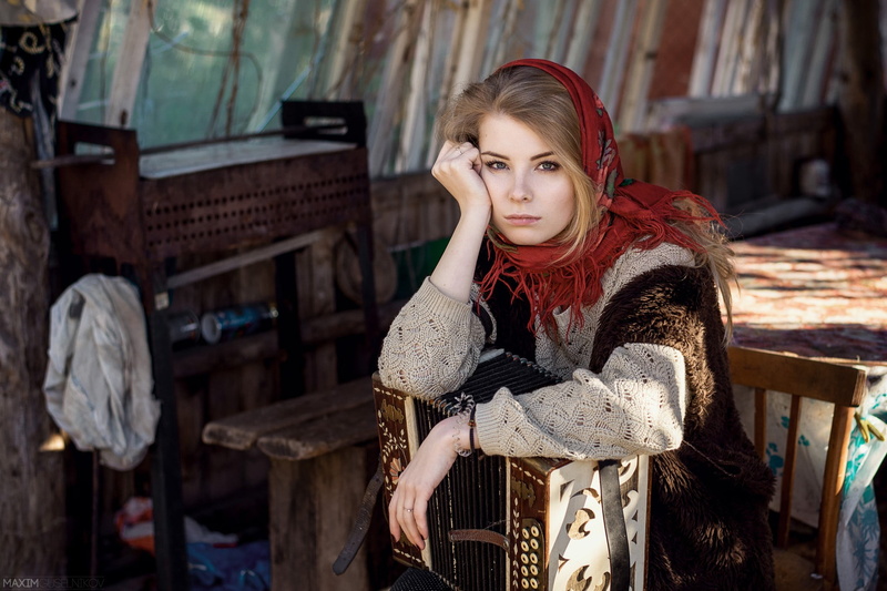 leather, standing, blonde, hairstyle, scarf, fashion, long hair, young women, young adult, adult, traditional clothing, focus on foreground, looking at camera
