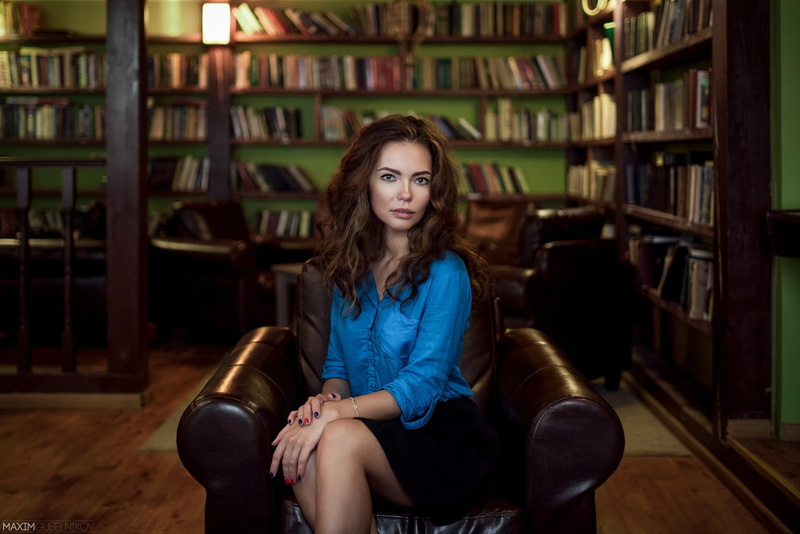 couch, armchair, beautiful woman, front view, casual clothing, 1080P, bookshelf, sitting, young adult, young women, real people, brunette, women, portrait