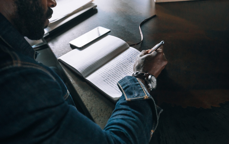 working, creative, daytime, business, male, phone, indoors, businessman, adult, notebook, home Interior, sitting, workspace, daylight, pen, writing, document