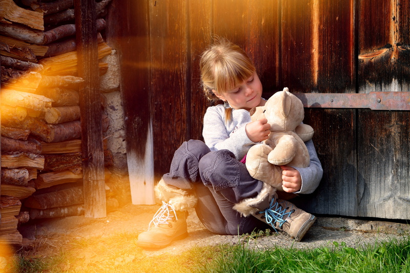 baby, caucasian Ethnicity, people, stuffed toy, pants, small, black, females, positive emotion, child, grey, offspring, women, teddy bear, girl, sitting