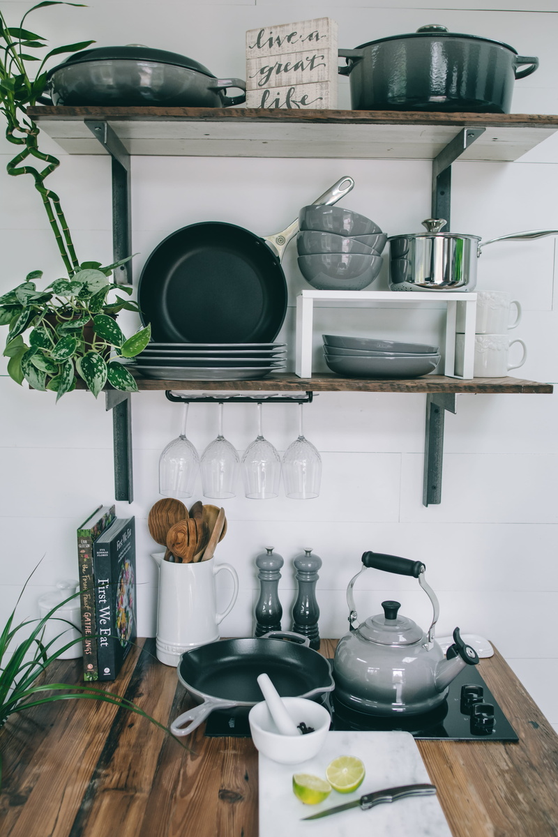 teapot, le creuset, interior design, oven, coffee pot, stove, mortar and pestle, container, mug, pottery, appliance, furniture, room, crockery, indoors