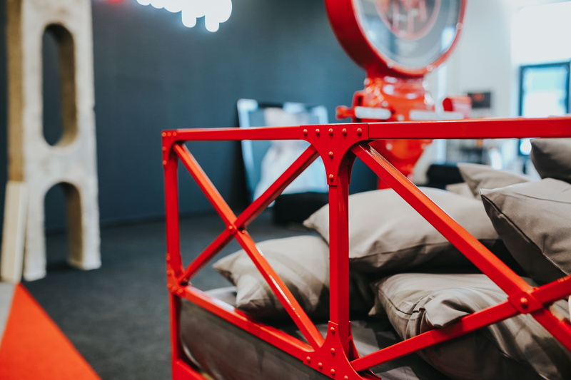 red, close-up, factory, day, safety, cushions, table, machinery, no people, midsection, glass, Beds, focus on foreground, exhibition, 5K, scales, bedding