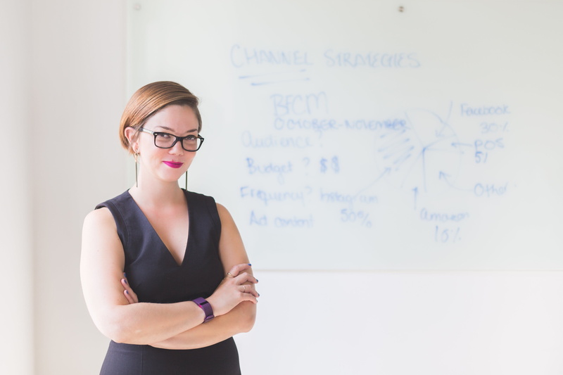 teacher, Professional, contemplation, looking at camera, hairstyle, one person, Happy, glasses, indoors, waist up, standing, Women, Smile, education, Business