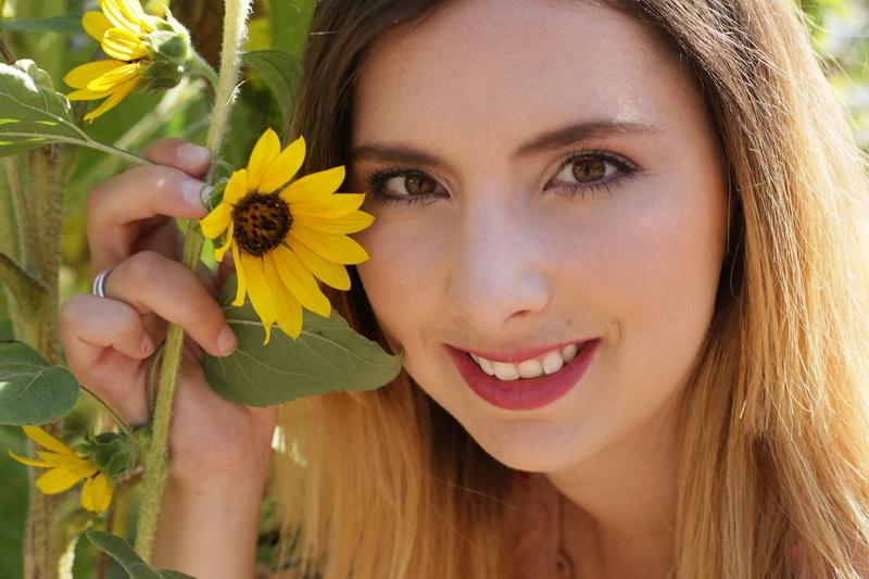 real people, flower, beauty, flower head, women, portrait, closeup, fashion, one person, young women, looking at camera, sunflower, yellow, freshness, young adult