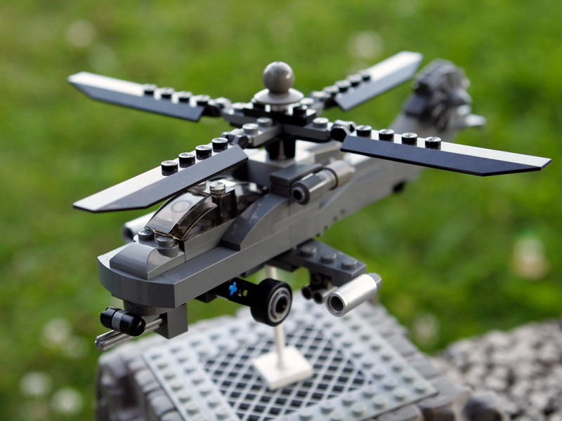 belief, day, selective focus, military, close-up, machinery, plant, Boeing AH-64 Apache, toys, religion, grave, green color, helicopters, nature, technology