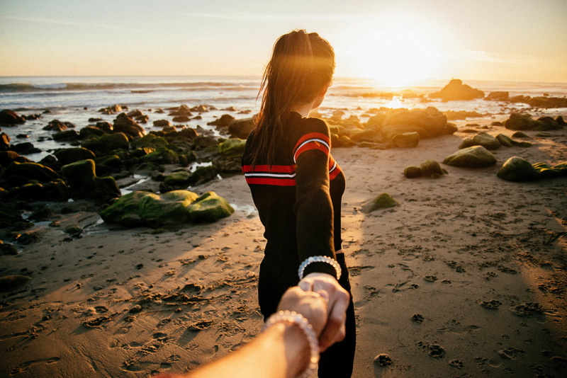 land, one person, sunset, photography, horizon over water, back, leisure activity, women, lifestyles, outdoors, nature, sky, sand, hand wraps, landscape