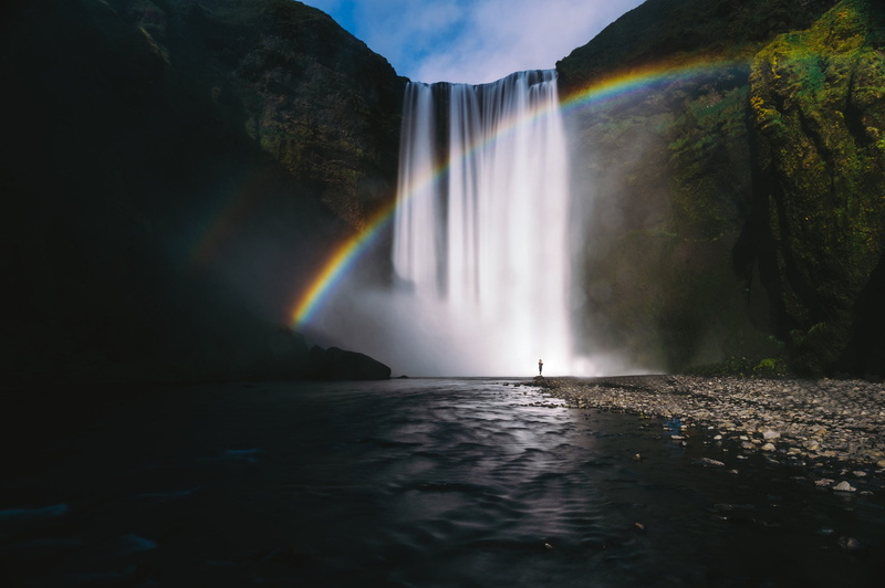 scenics - nature, blurred motion, waterfall, rock - object, water, beauty in nature, nature, idyllic, Iceland, sun rays, rainbows, men, river, waterfront
