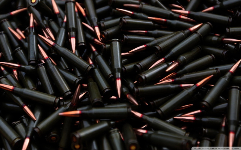 bullet, black, weapon, large group of objects, close-up, arrangement, ammunition, heap, lot, selective focus, directly above, indoors, black color, no people