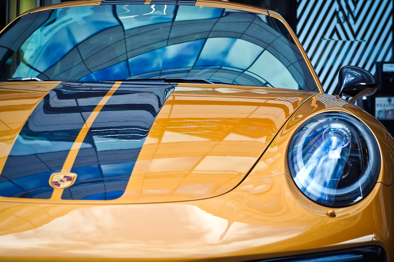 brand, emblem, porsche, ps, close-up, auto, land vehicle, yellow, noble, 911, luxury car, glass - material, vehicle, zuffenhausen, automobile manufacturers