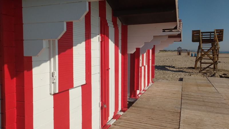 footpath, building, in a row, costa, beach, red cross, building exterior, day, shadow, no people, summer, architecture, wall - building feature, wood - material