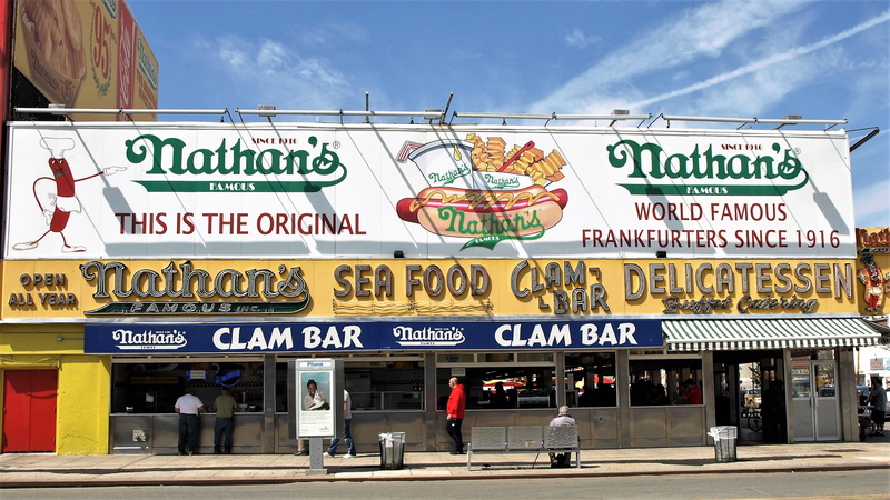 sign, guidance, building exterior, communication, script, architecture, street, coney island, original, no people, text, day, transportation, advertisement